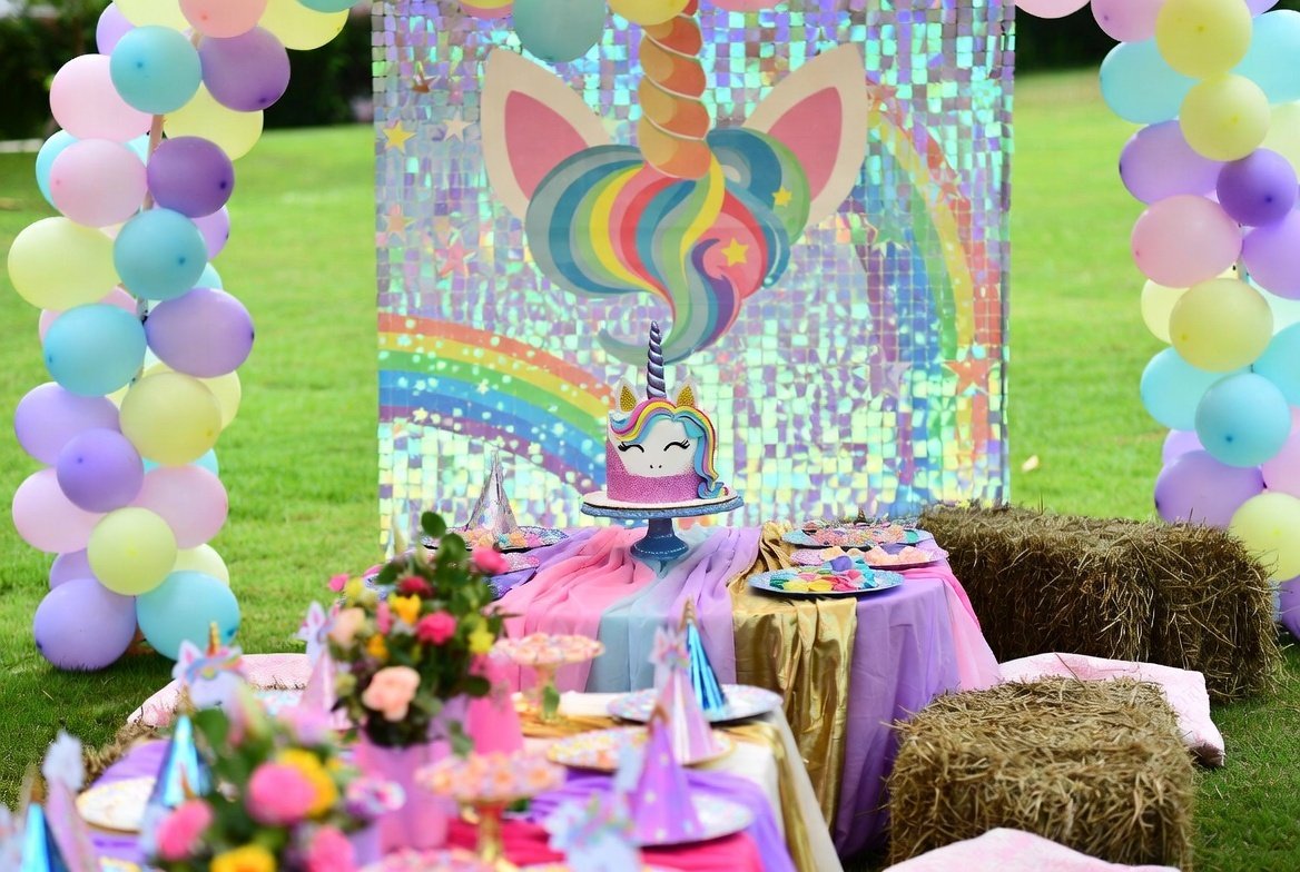 Unicorn themed pony party with children in unicorn hats